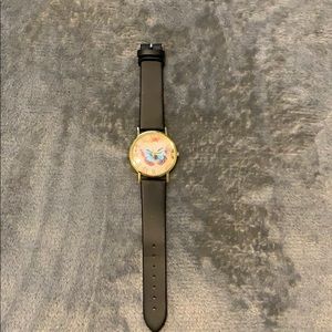 A black watch with butterfly print
